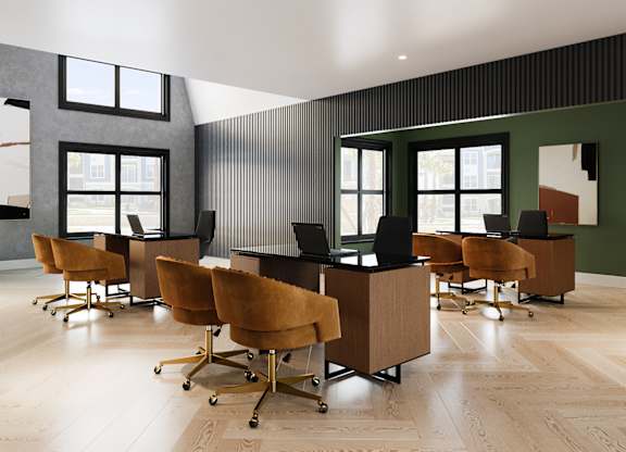A conference room with a long table and chairs.