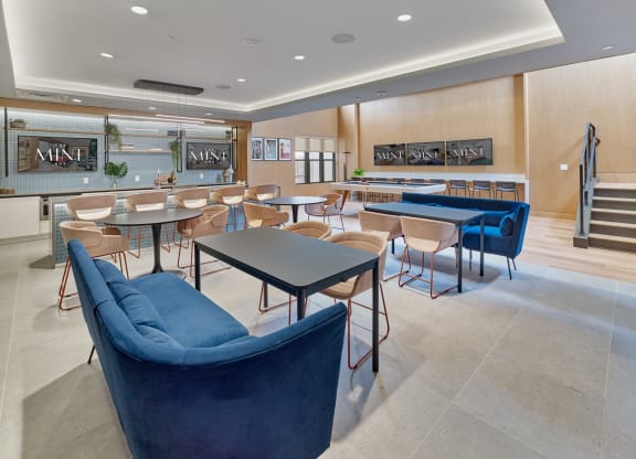 Modern dining and lounge area at The Mint Rahway with stylish seating, close to Rahway Train Station and Union County Performing Arts Center.