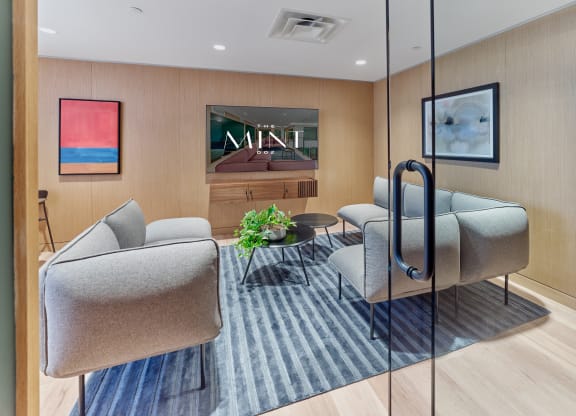 Cozy seating area at The Mint Rahway, featuring stylish furniture and decor, near Merck Pharmaceutical and Rahway Train Station.
