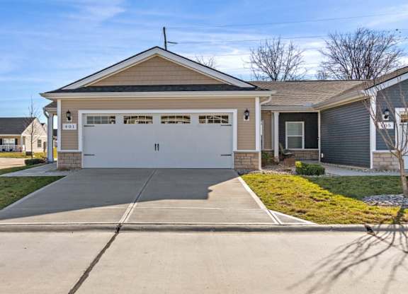 Modern rental homes with private driveways and attached garages