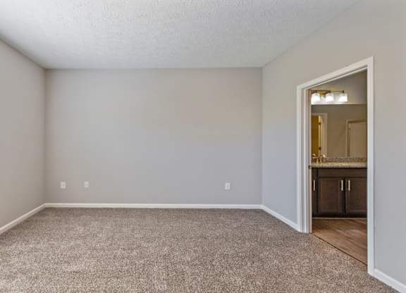 Cozy bedroom with modern paint color in an apartment for rent in Florence, KY