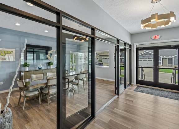 Modern clubhouse with stylish furnishings and open floor plan in The Villages of Florence and Weaver Mill