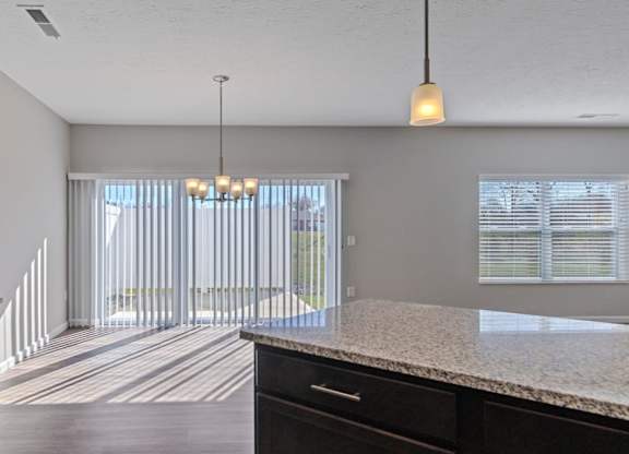Spacious kitchen island with bar seating in Florence, KY home