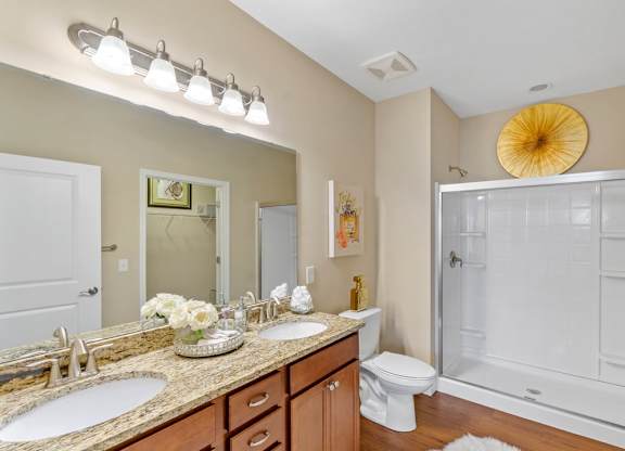 Stylish bathroom with walk-in shower and tile flooring in Florence, KY