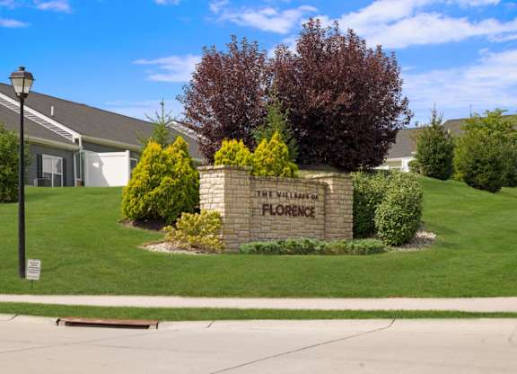 Welcome sign at The Villages of Florence and Weaver Mill