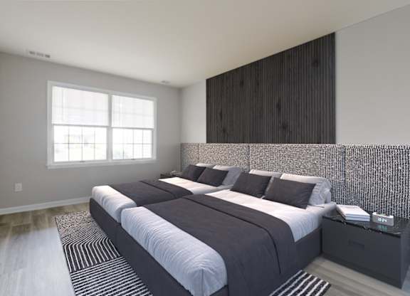 A contemporary bedroom layout at The Village at Bridgewater in Bridgewater, NJ. Large windows provide ample sunlight, complemented by modern flooring and neutral wall colors.
