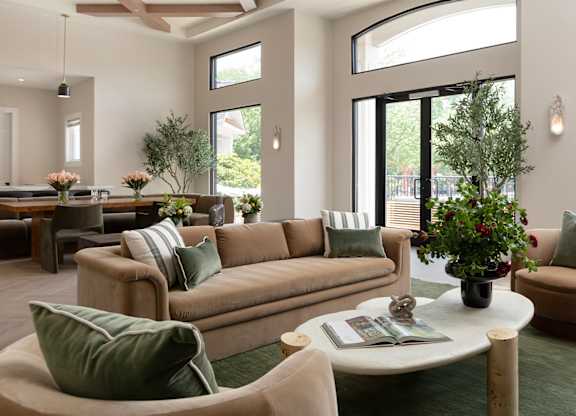 Spacious lounge area with elegant furniture and large windows, ideal for those seeking luxury apartments in Princeton NJ or move-in ready condos in Princeton.