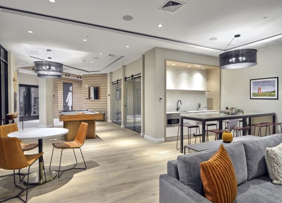 Luxurious common area with seating and billiards at The Mint Rahway, an apartment rental community close to Rahway Train Station and NYC.