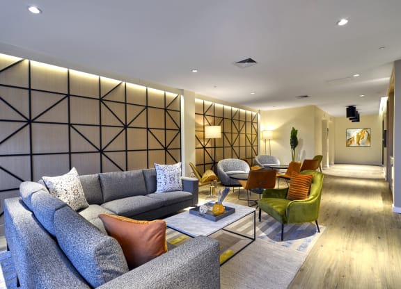 Elegant lounge area at The Mint Rahway featuring stylish seating and decor, conveniently located near Merck Pharmaceutical and Rahway Train Station.