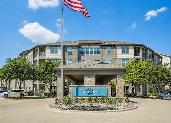 A building with a sign that says Fireproof in front of it.