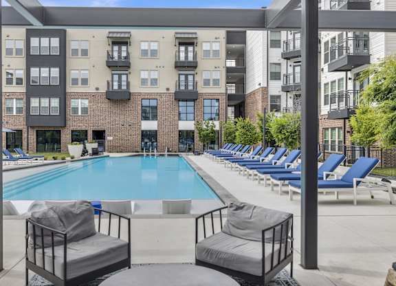 our apartments have a resort style pool with lounge chairs