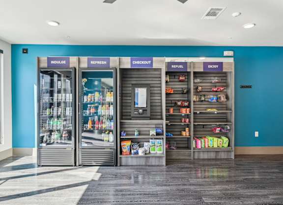 A store with a blue wall and a sign that says "refuel" on it.