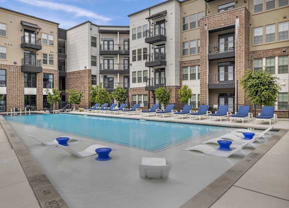 our apartments have a large pool with lounge chairs