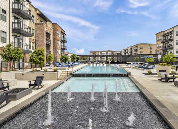 the preserve at ballantyne commons pool and apartment buildings