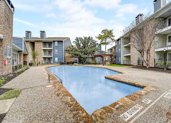 the swimming pool at the preserve at polk apartments