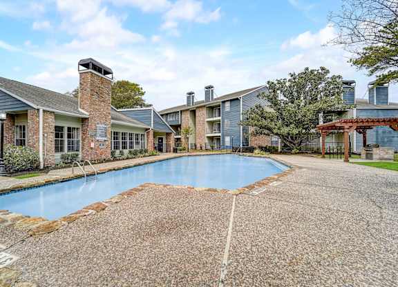 the preserve at ballantyne commons pool with apartment buildings