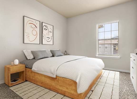 Primary bedroom with platform bed, modern wall art, and large window.
