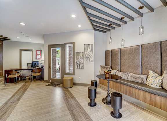 the living room of a house with a couch and a table