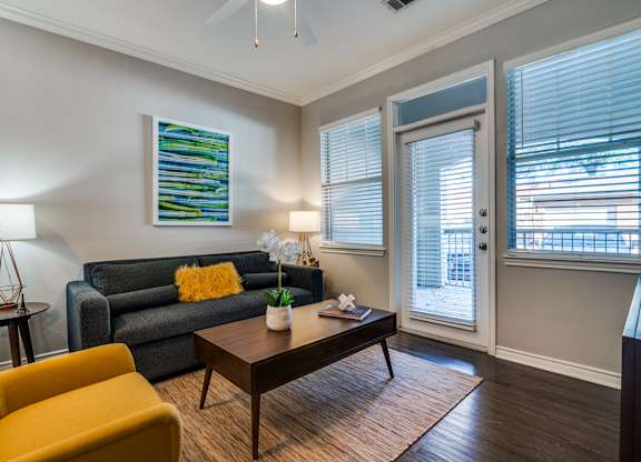 a living room with a couch and a coffee table