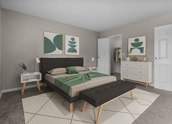 a bedroom with a bed and a dresser
