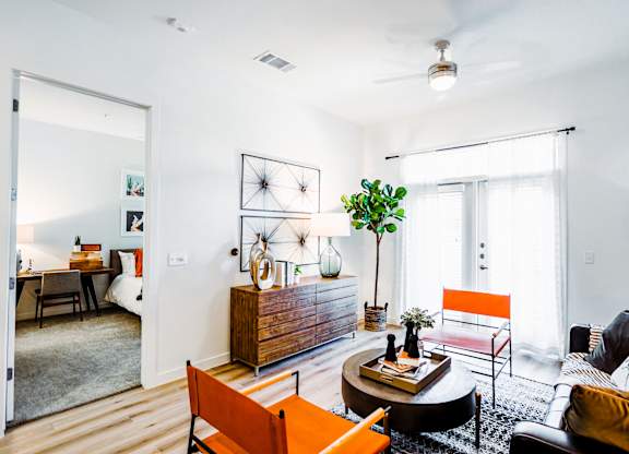 a living room with a couch and a table