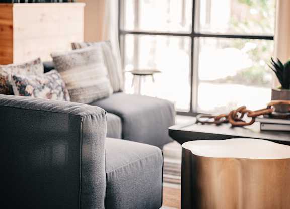 a living room with two couches and a coffee table