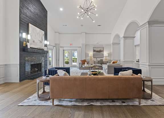 a living room with a couch and a fireplace