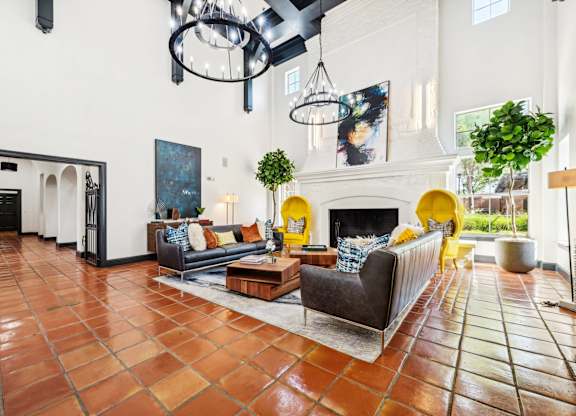 a living room with couches and a fireplace