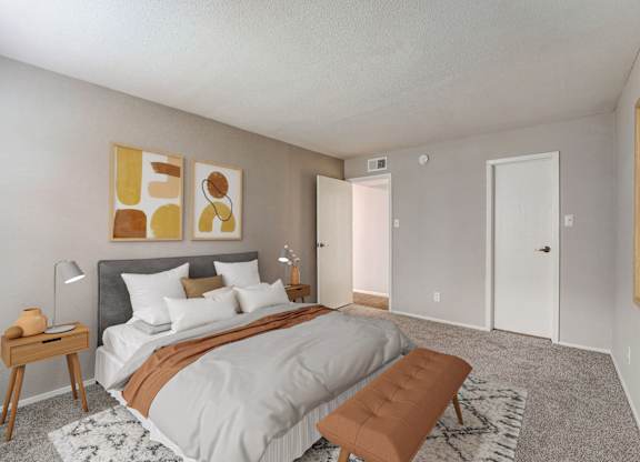 a bedroom with a large bed and a closet