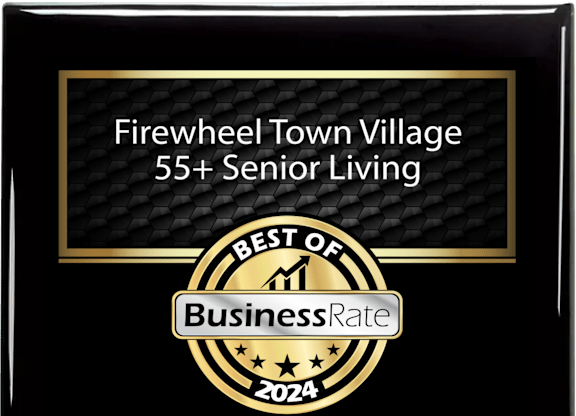 A black and gold award plaque for Firewheel Town Village 55+ Senior Living.