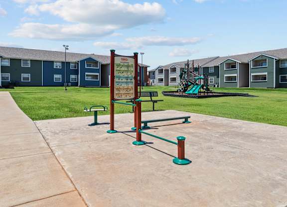 a playground at the whispering winds apartments in pearland, tx