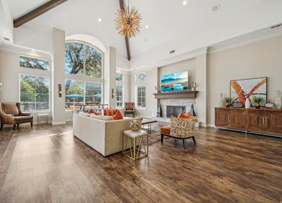 a living room with a couch and a fireplace