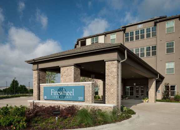 a large building with a sign in front of it