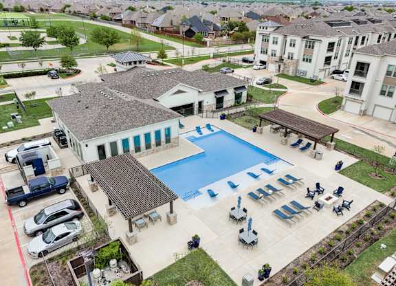 an aerial view of the pool at the estates at spring valley