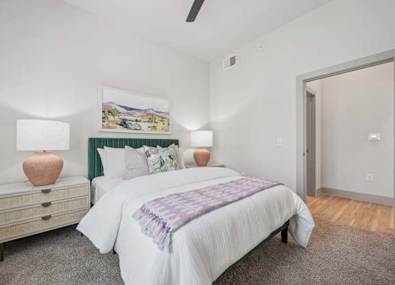 a bedroom with a bed and a closet