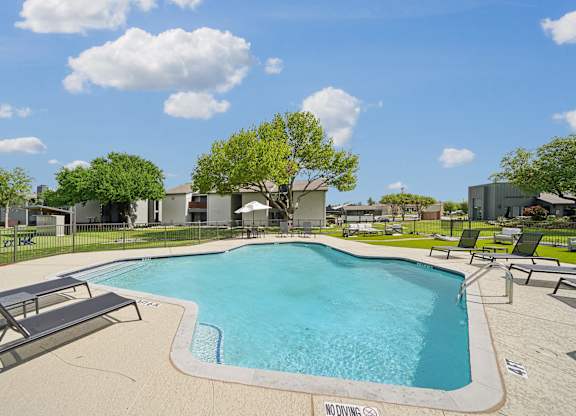 our apartments have a resort style pool with lounge chairs