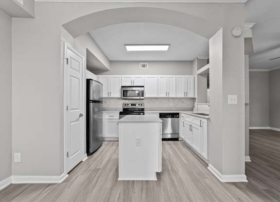 Spacious kitchen at Townhomes of Bent Tree with center island and open layout.
