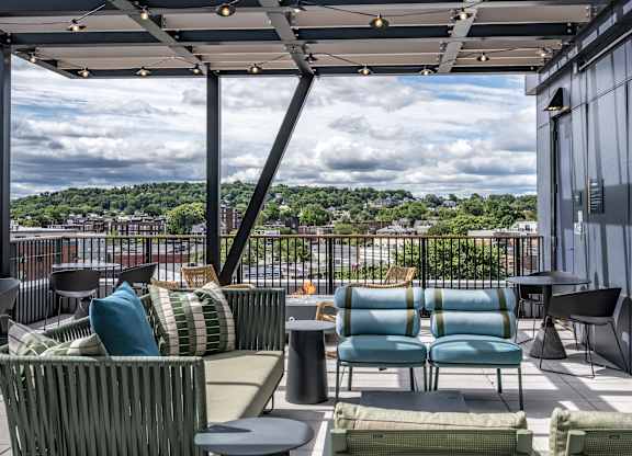 A patio with a view of the cityscape.