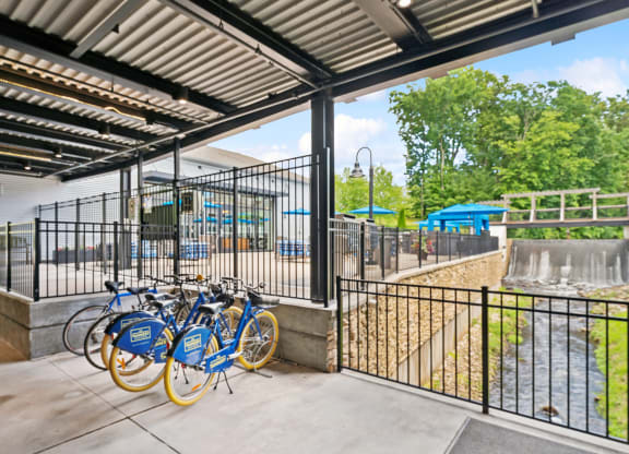 a group of bikes parked outside of a bike rack at The Tannery, Glastonbury, Connecticut
