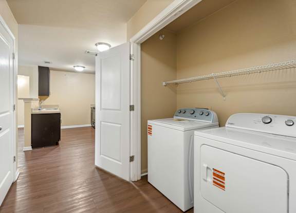 A laundry room with a washer and dryer.