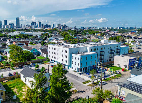 A cityscape with a mix of residential and commercial buildings.