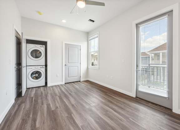 A room with a washer and dryer in it.