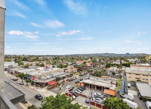 a view of the city from the top of a building at The Fairfax Flats Apartments, California, 90019
