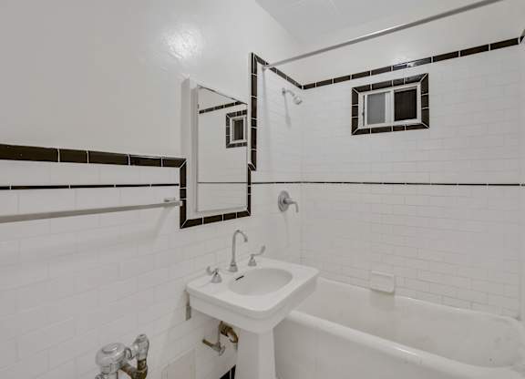 Bathroom with shower at The Langham Apartments, Los Angeles, California