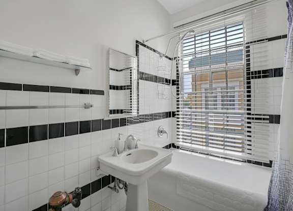 Bathroom with sink at The Langham Apartments, Los Angeles, California