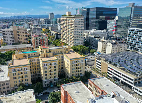 Cityscape with a mix of modern and older buildings at The Langham Apartments, California