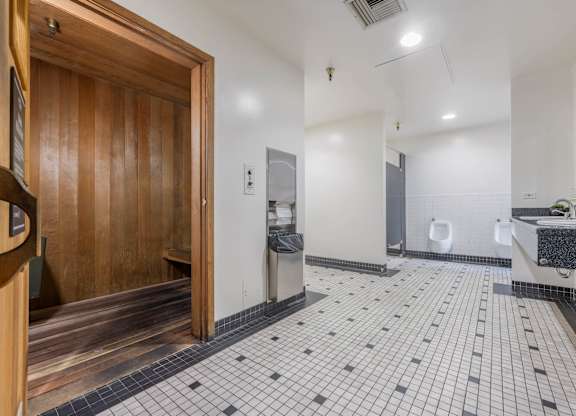 Bathroom with sink and mirror at Grand Central Market Apartments, Los Angeles, CA