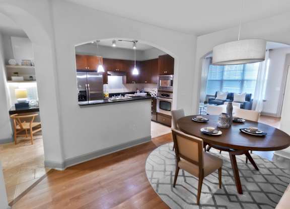 Kitchen and Dining Area with Round Table at The Estates at Ballantyne, Charlotte, NC, 28277