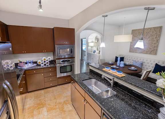 Kitchen with Granite Countertops at The Estates at Ballantyne, Charlotte, NC, 28277