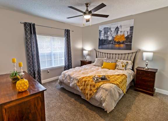master bedroom with king size bed at Lullwater at Calumet, Newnan